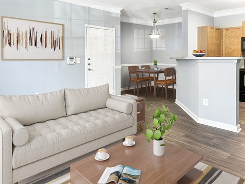 a living room with a couch and a table